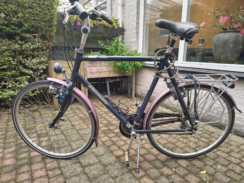 Gazelle fiets 58 inch met 2 nieuwe banden en verende pen., Fietsen en Brommers, Ophalen, Gebruikt, Velgrem, Versnellingen