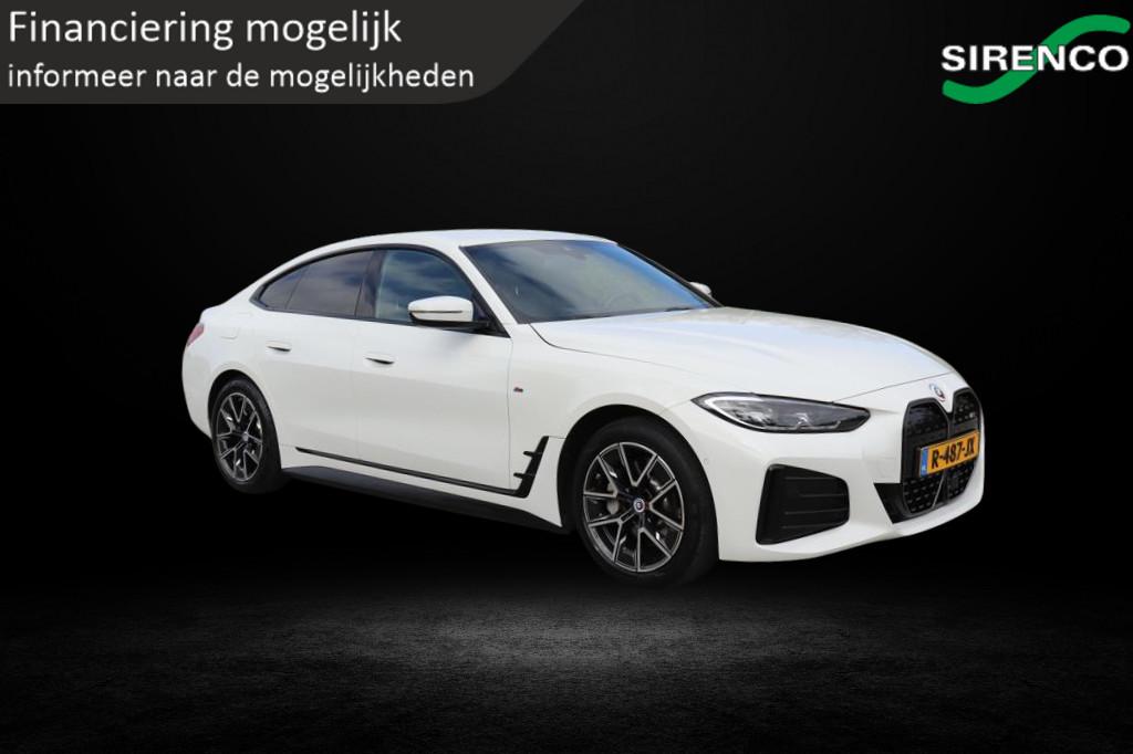 BMW i4 eDrive40 High Executive 84 kWh | M-pack binnen en bui, Parkeersensor, Achterwielaandrijving, Gebruikt, Zwart