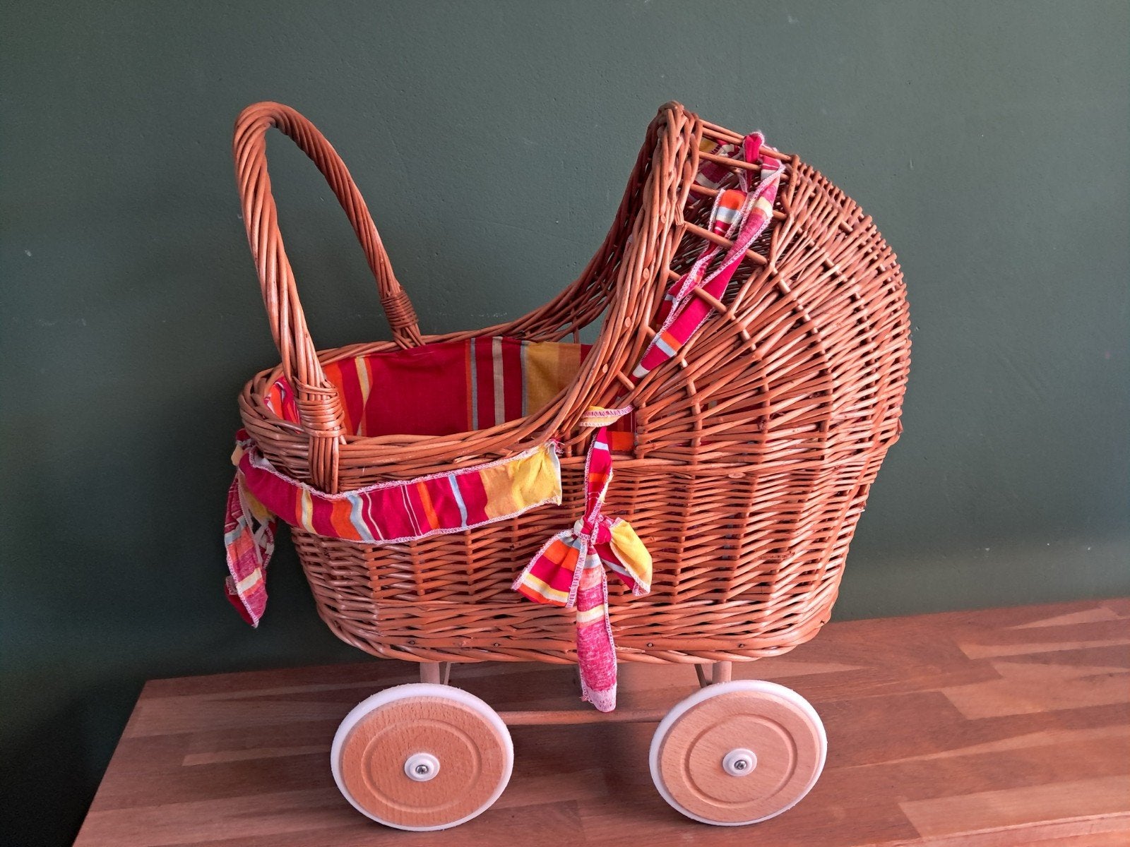 De Groene Merel rieten poppenwagen met bekleding, Ophalen