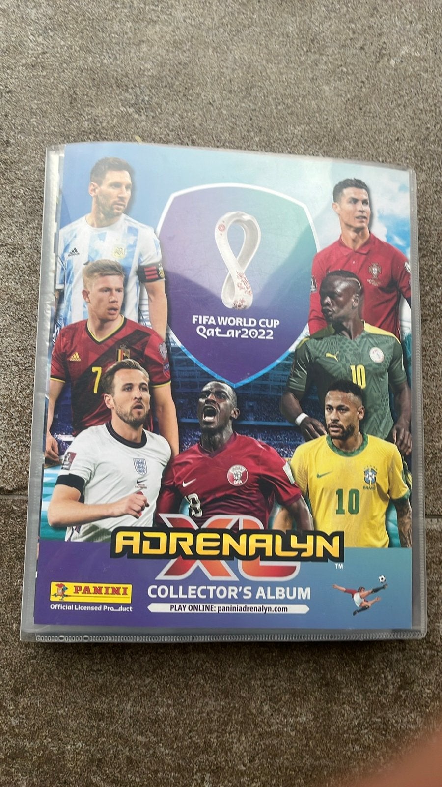 Panini FIFA World Cup Qatar 2022 Adrenalyn XL album + kaarte, Ophalen of Verzenden, Gebruikt, Overige sporten, Spelerskaart