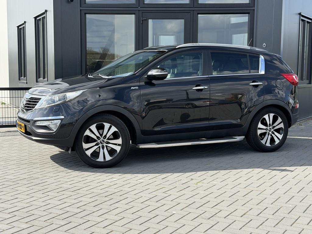 Kia Sportage 2.0 X-clusive 4wd Leer | Camera | Trekhaak | nw, Auto's, Kia, Automaat, Gebruikt, Zwart, 4 cilinders