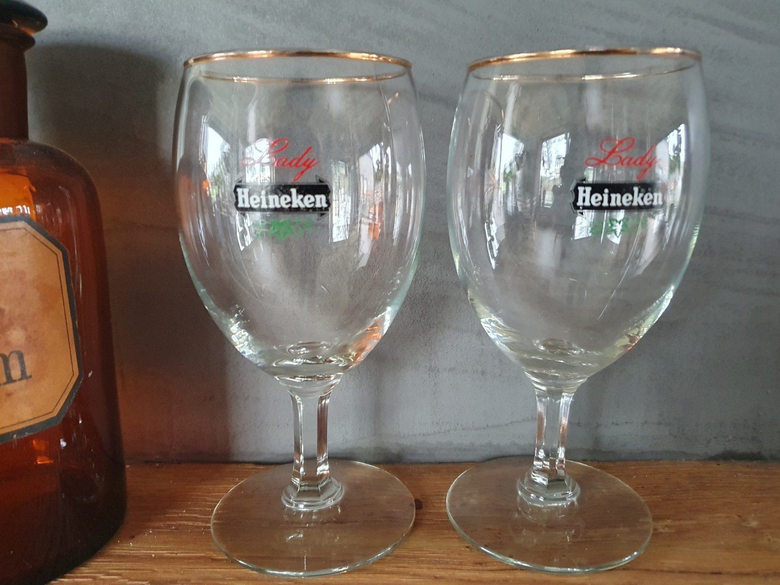 3 Heineken lady glazen, Ophalen of Verzenden, Zo goed als nieuw, Bierglas