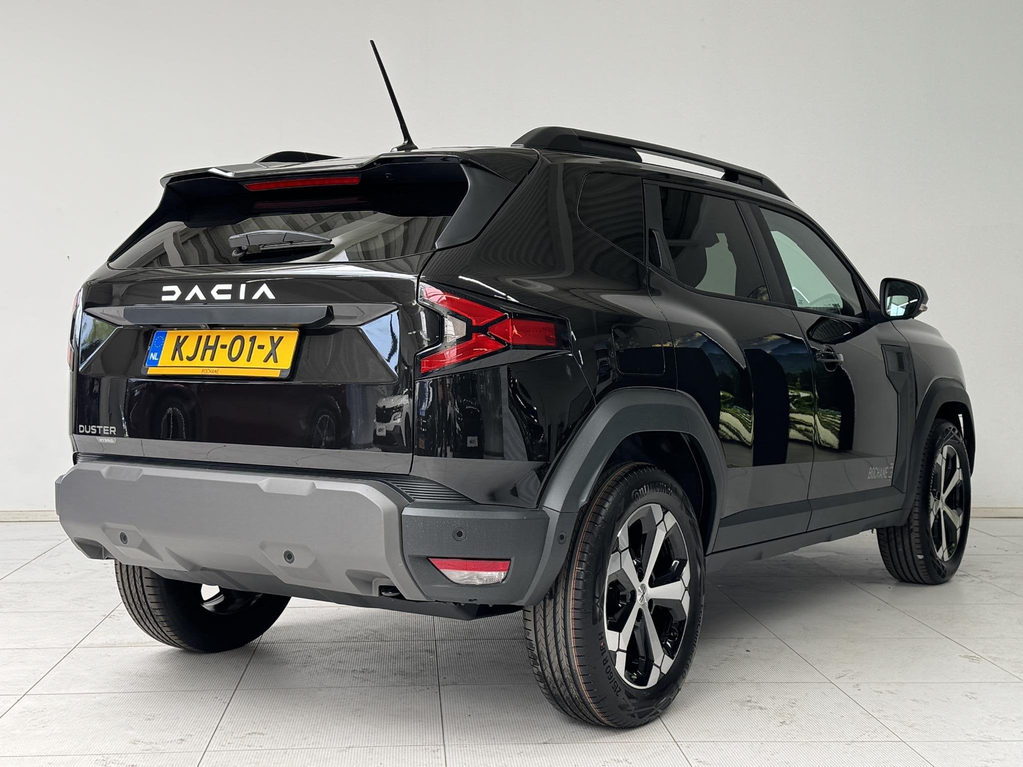 Dacia Duster 1.8 hybrid 155 limited edition | DEMO | Navigat, Auto's, Dacia, Stof, 1789 cc, Zwart, Origineel Nederlands