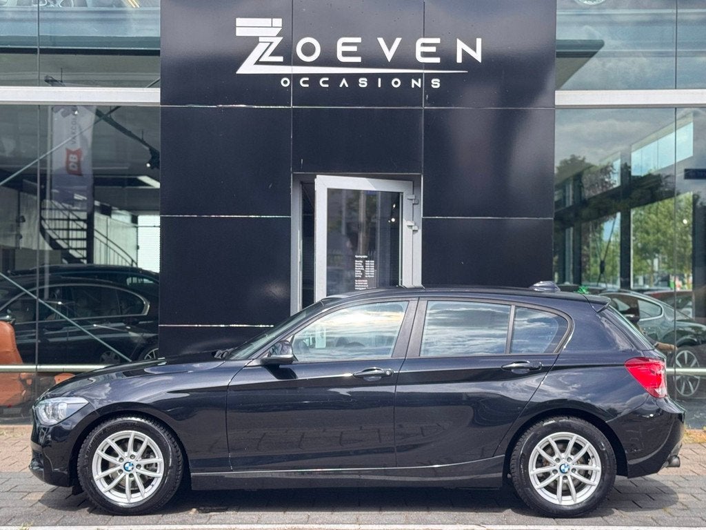 BMW 1-serie 116i Upgrade Edition, Auto's, BMW, 1-Serie, Euro 5, Gebruikt, Zwart