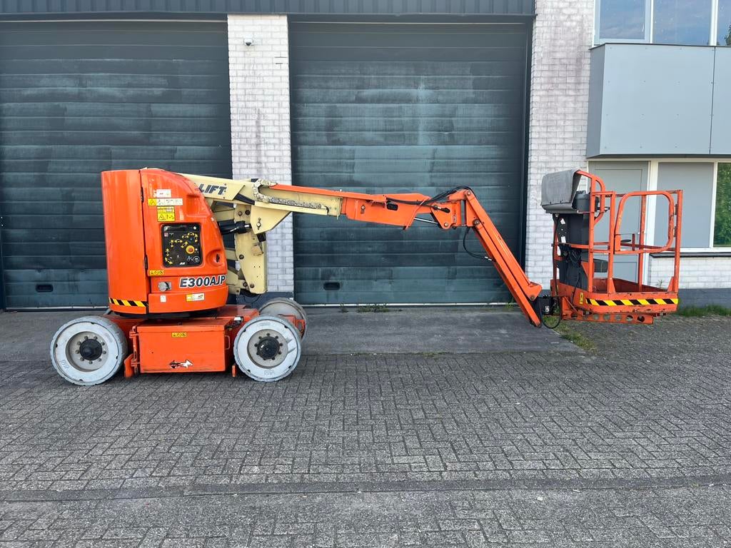 Nette JLG E300AJP Nieuwe accu’s Hoogwerker Knikarm schaar, Ophalen