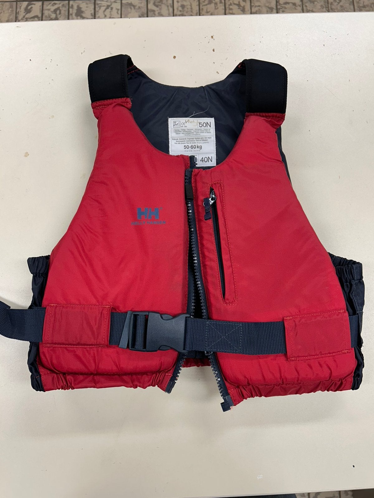 Helly Hansen Reddingsvest 50-60kg - Zo goed als nieuw, Ophalen, Zo goed als nieuw, Kind, Reddingsvest of Zwemvest