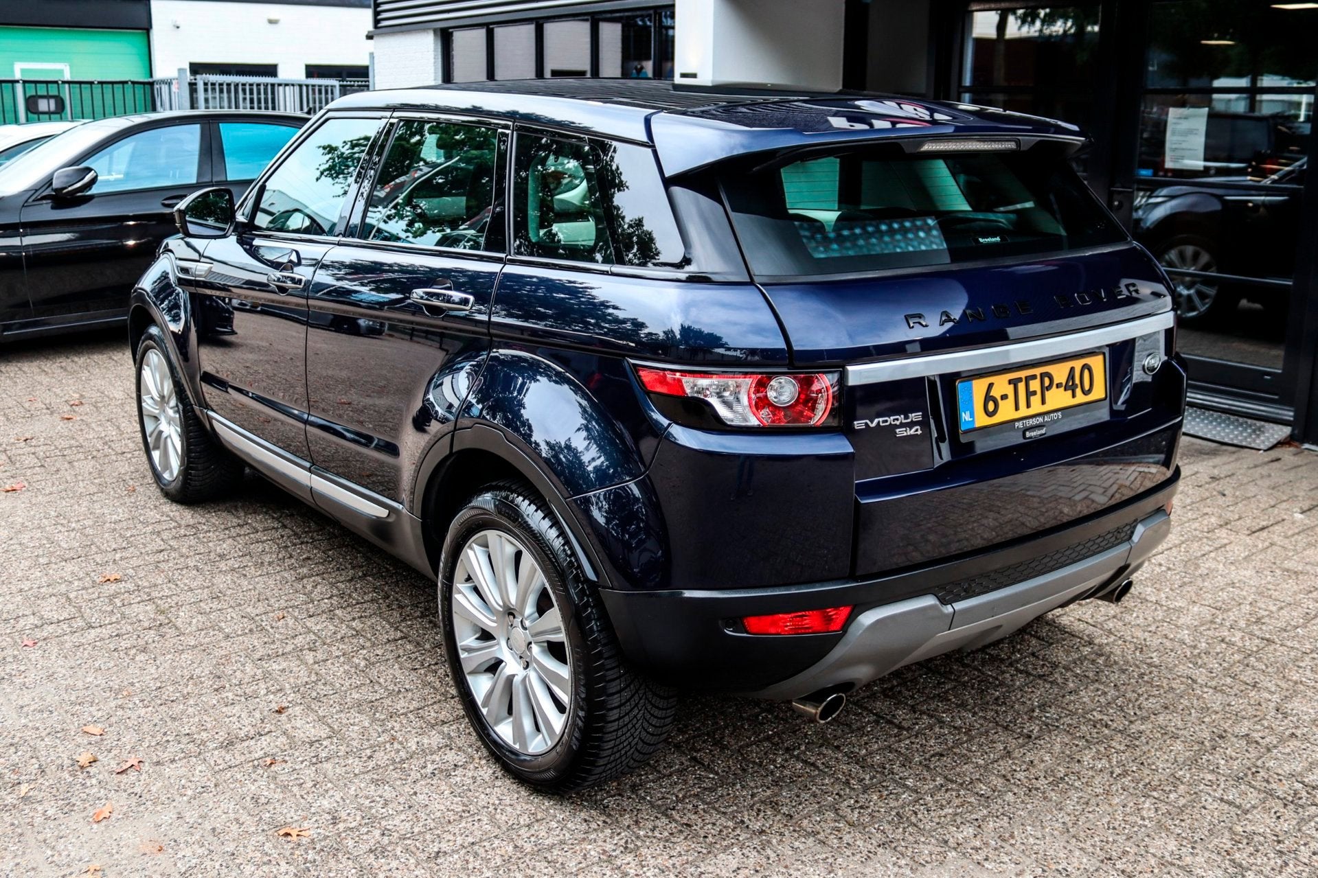 Land Rover Range Rover Evoque 2.0 Si 4WD NAP MERIDIAN PANO, Auto's, Euro 5, 4 cilinders, Blauw, Bedrijf