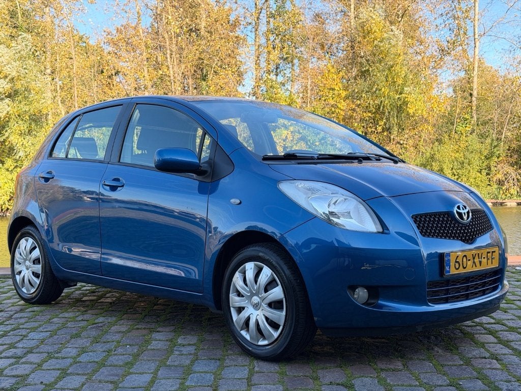 Toyota Yaris 1.3 16V Vvt-i 5DR 2007 Blauw, Auto's, Voorwielaandrijving, Stof, 40 €/maand, Zwart