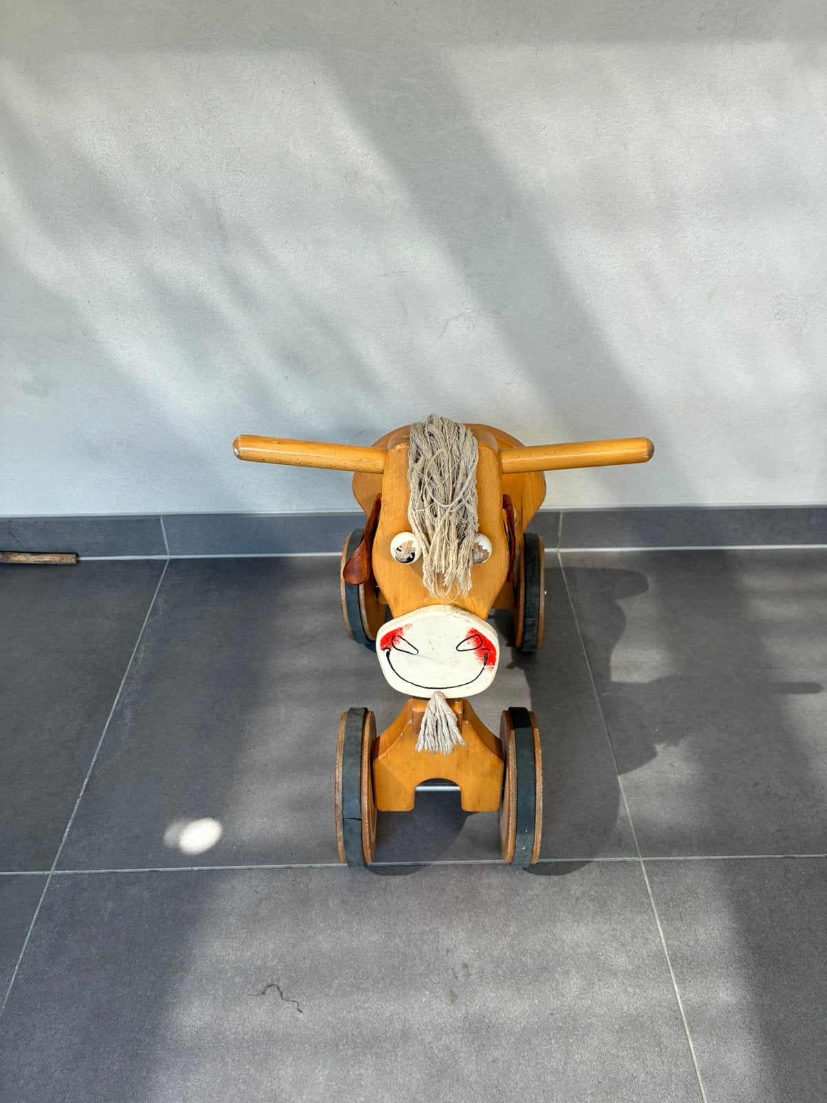 Houten koe loopfiets, Ophalen, Gebruikt