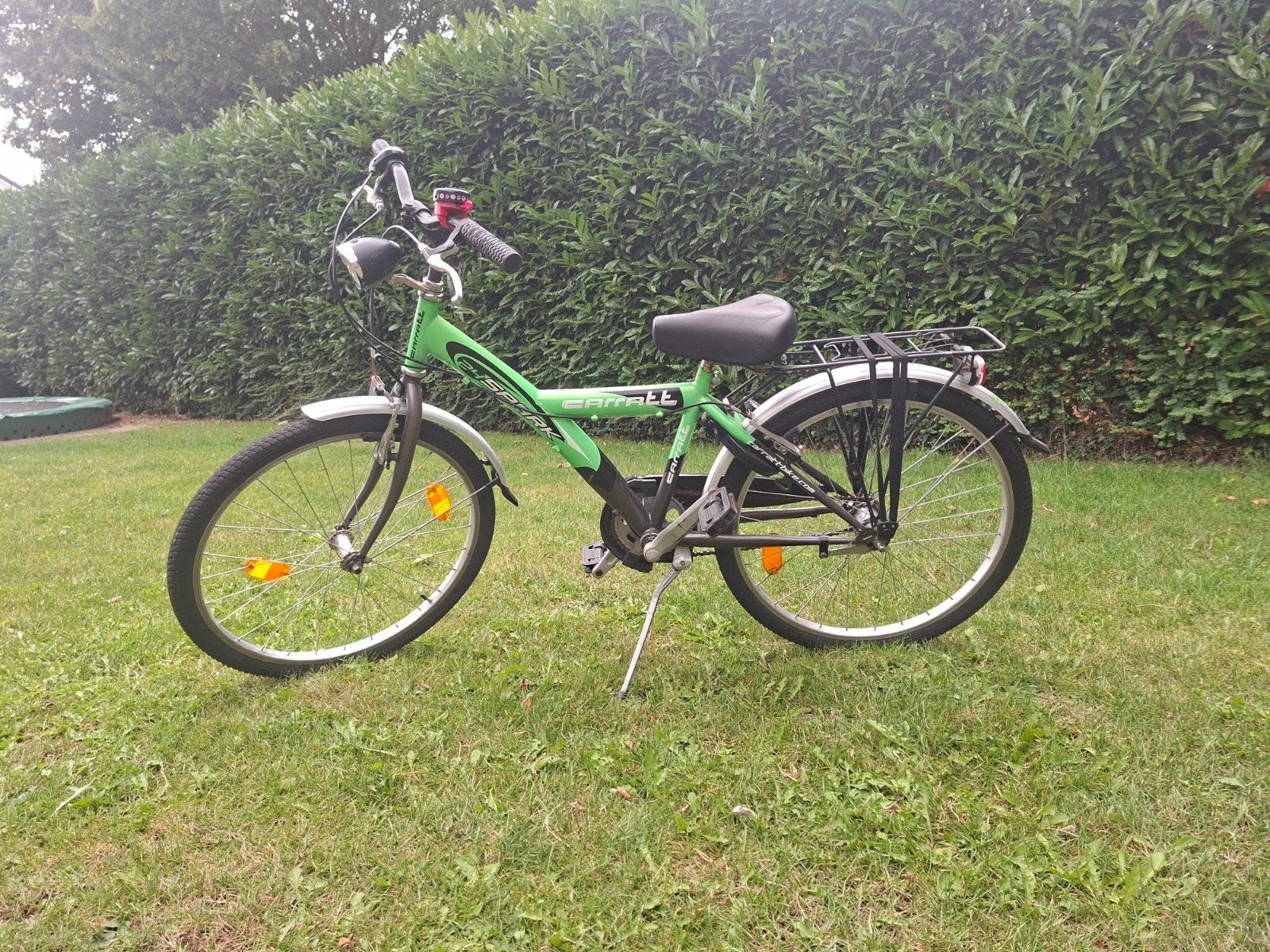 Groene Spark 24 inch kinderfiets met bagagedrager, Fietsen en Brommers, Ophalen, 20 inch of meer, Gebruikt, Velgrem