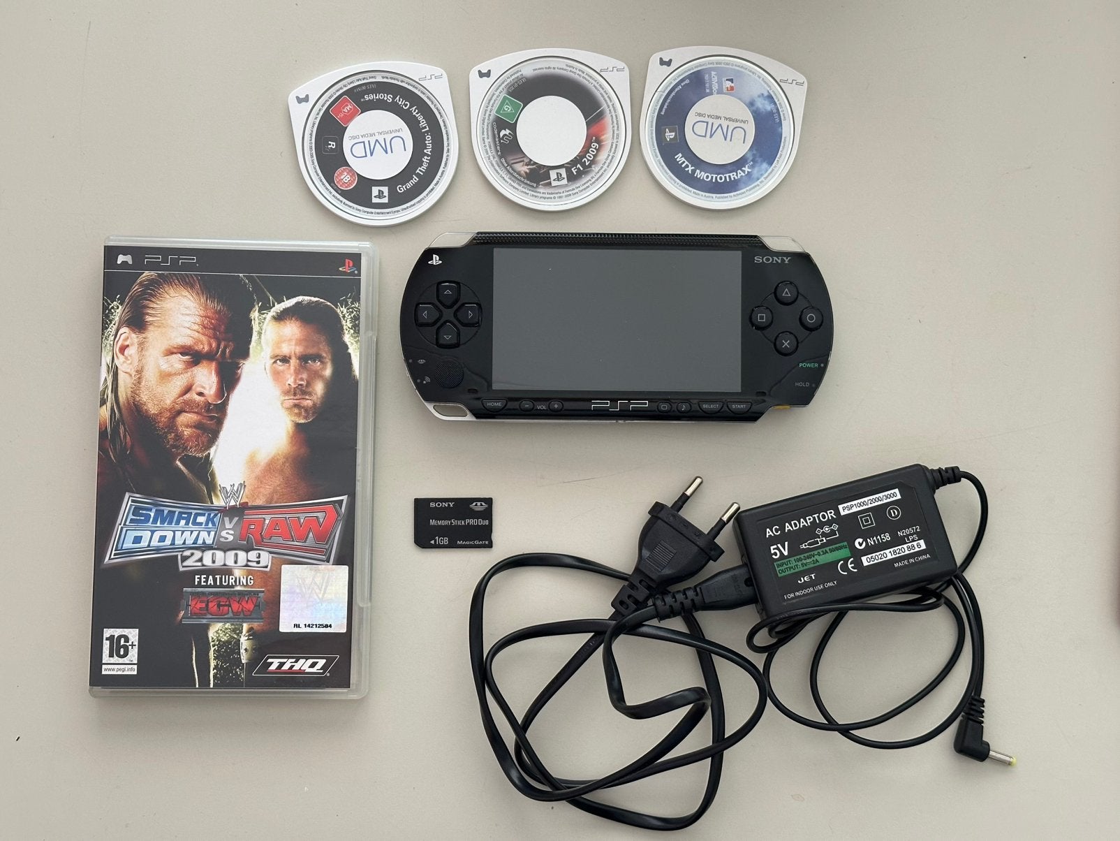 Sony PSP-1004 Playstation Portable + games, Spelcomputers en Games, Spelcomputers | Sony PSP, Zwart, Ophalen of Verzenden, PSP