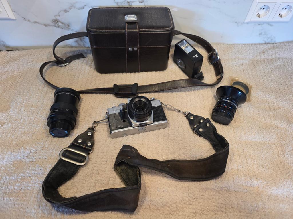 Praktica Super TL1000 camera set met 3 lenzen, Ophalen of Verzenden, Gebruikt