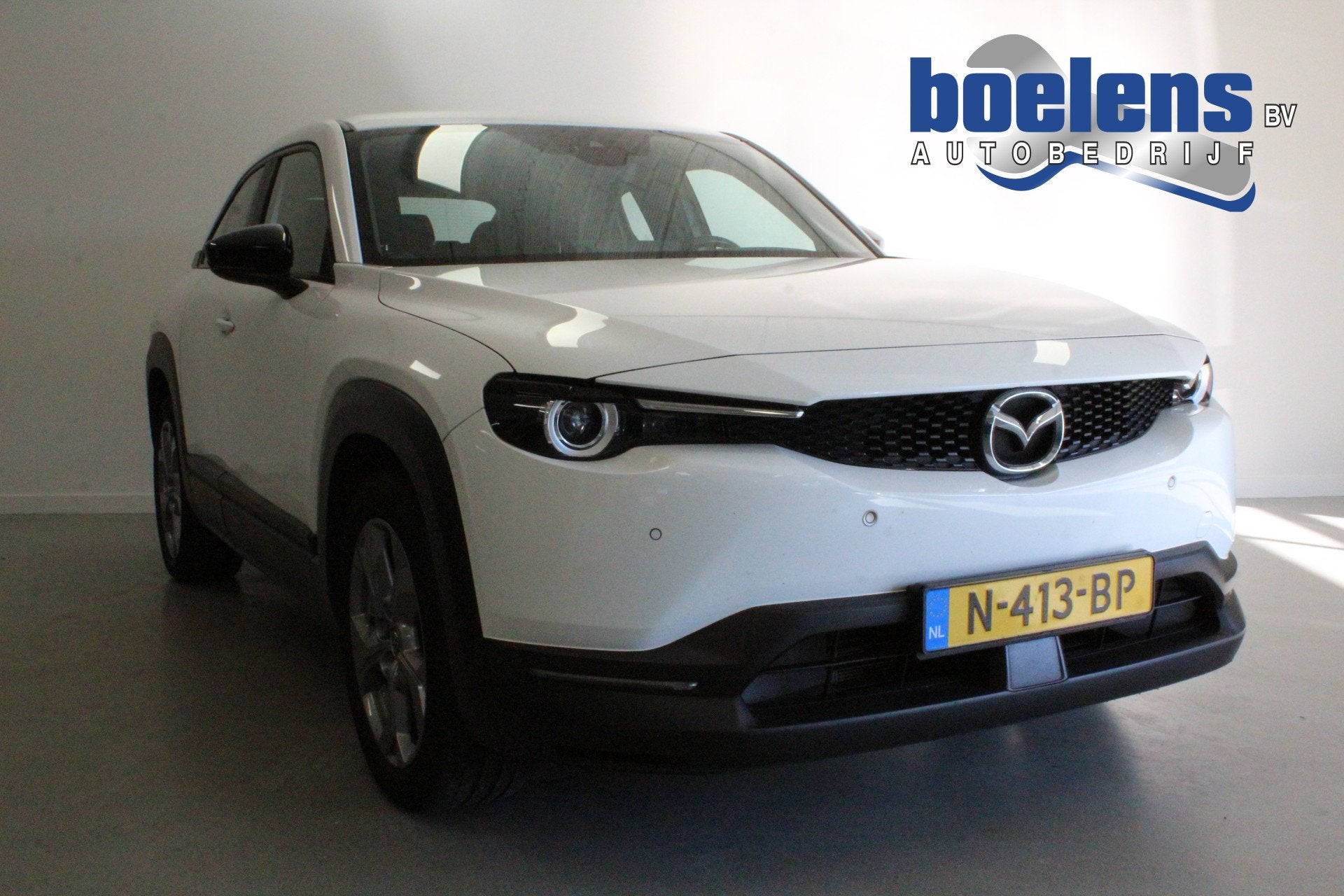 Mazda MX-30 e-SkyActiv 145 36 kWh | WARMTEPOMP | DAB-RADIO |, Auto's, Stof, Gebruikt, Zwart, Origineel Nederlands