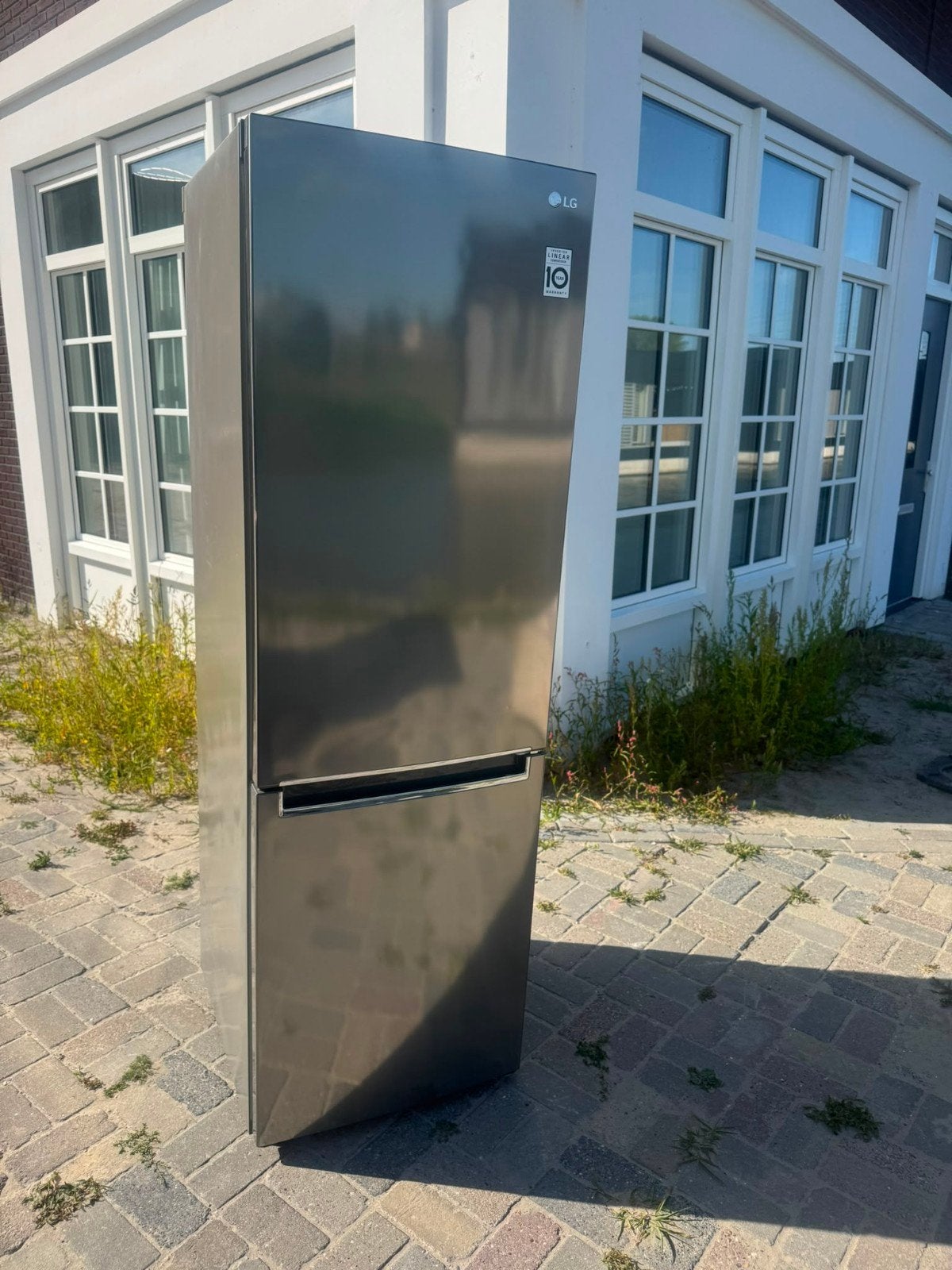 LG koelkast mooi bezorgen mogelijk, 200 liter of meer, Met aparte vriezer, Zo goed als nieuw, 160 cm of meer