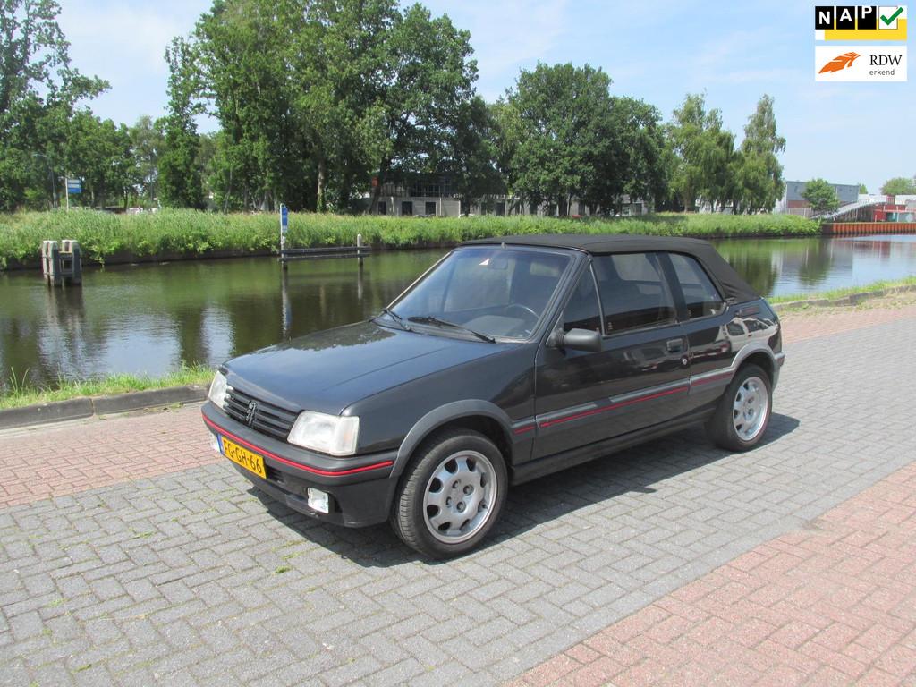 Peugeot 205 1.9 CTI GTI Cabrio Nederlandse dealerauto met hi, Voorwielaandrijving, Stof, Gebruikt, 31 €/maand