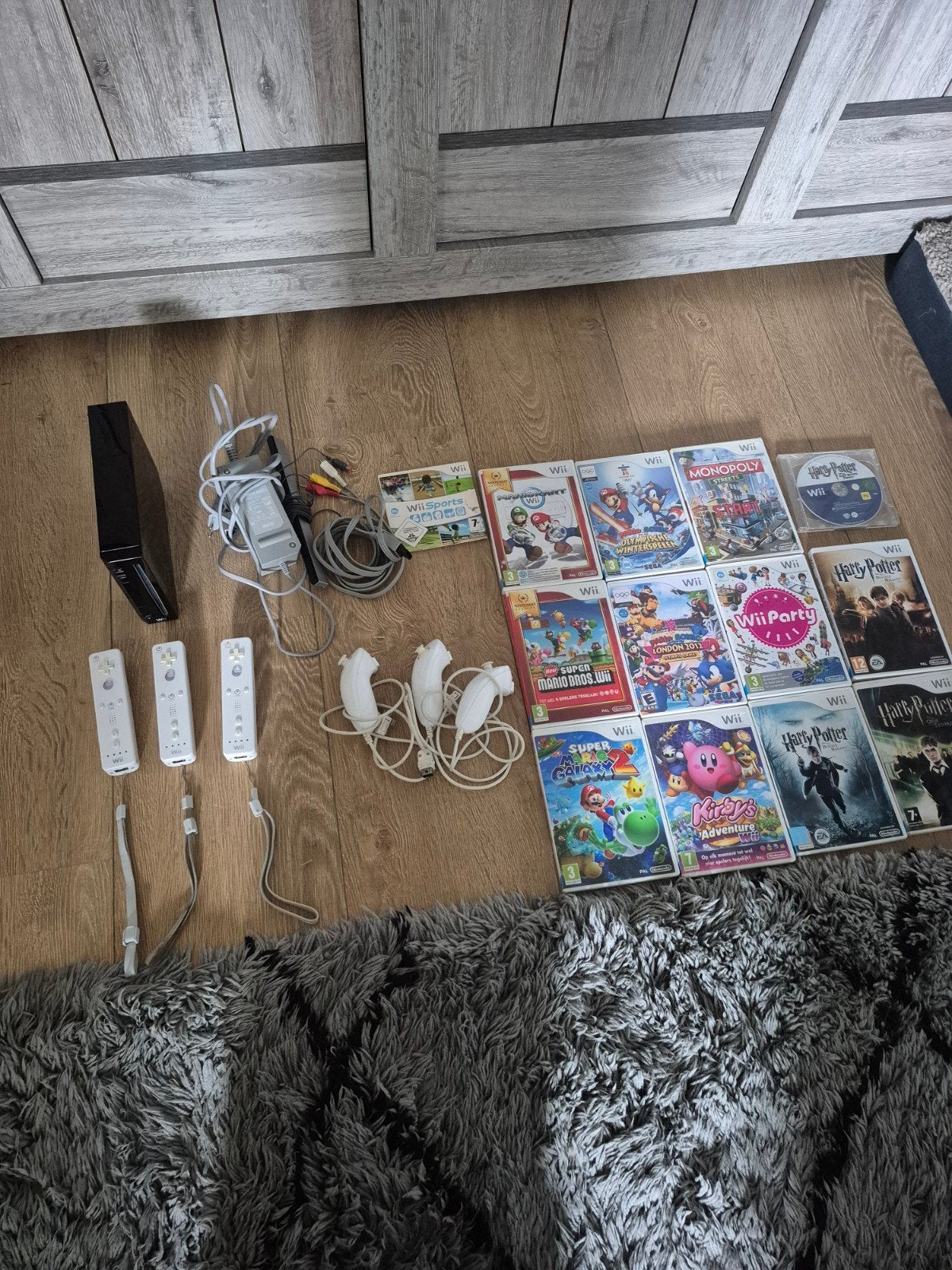 Nintendo Wii Zwart Compleet met 3 controllers en games, Ophalen of Verzenden, Zo goed als nieuw, Met 3 controllers of meer, Met games