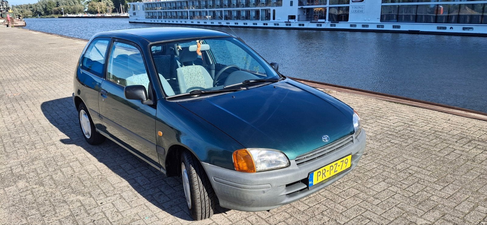 Toyota Starlet 1.3 16V 1996 Groen Nw APK, Auto's, Voorwielaandrijving, Dealer onderhouden, Stof, Beige