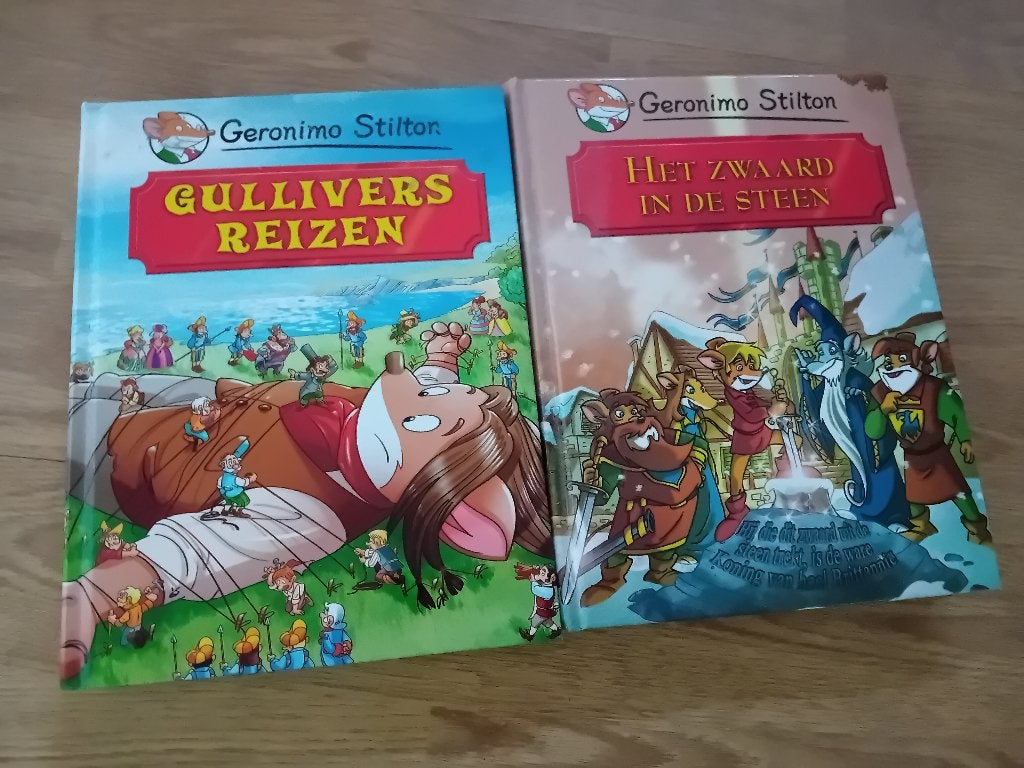 Geronimo Stilton Gullivers Reizen Het Zwaard in de Steen, Boeken, Ophalen of Verzenden, Zo goed als nieuw, Geronimo Stilton, Fictie algemeen