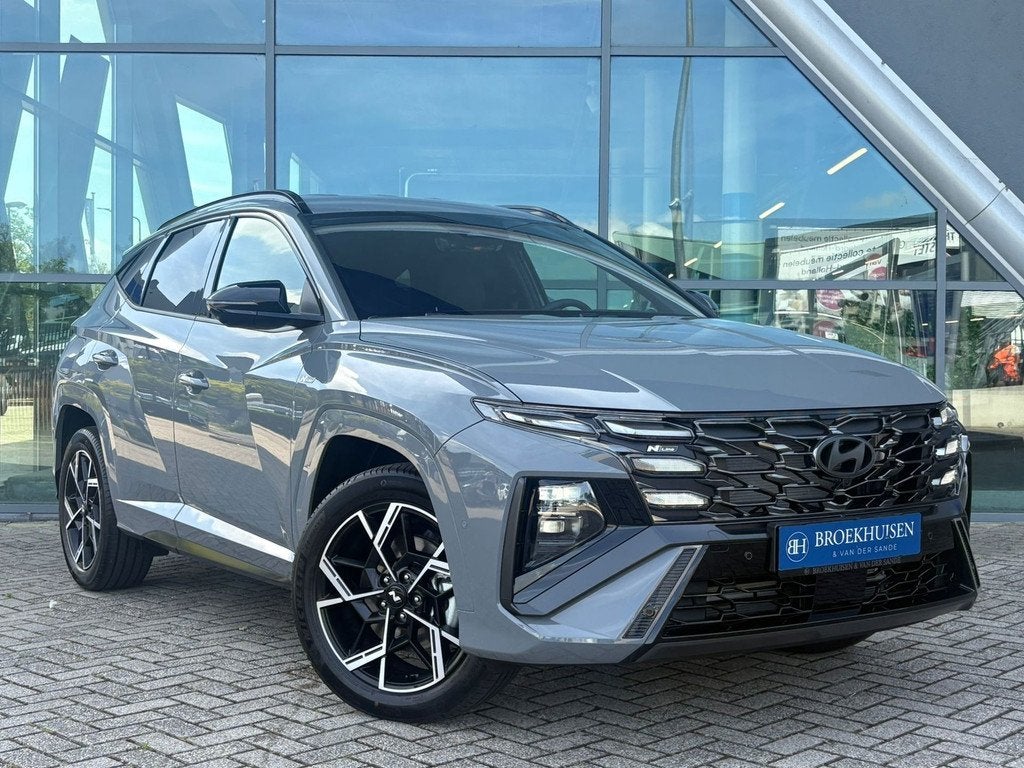 Hyundai Tucson 1.6 T-GDI PHEV N Line Sky 4WD 265pk FACELIFT, Auto's, Hyundai, Zwart, 4 cilinders, Adaptive Cruise Control, Bedrijf