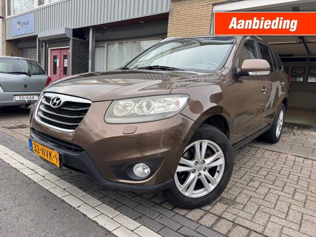 Hyundai SANTA FE 2.4i CVVT 4WD Style CLIMA LEER DAK NETTE AU, Auto's, Automaat, Euro 5, Gebruikt, Navigatiesysteem
