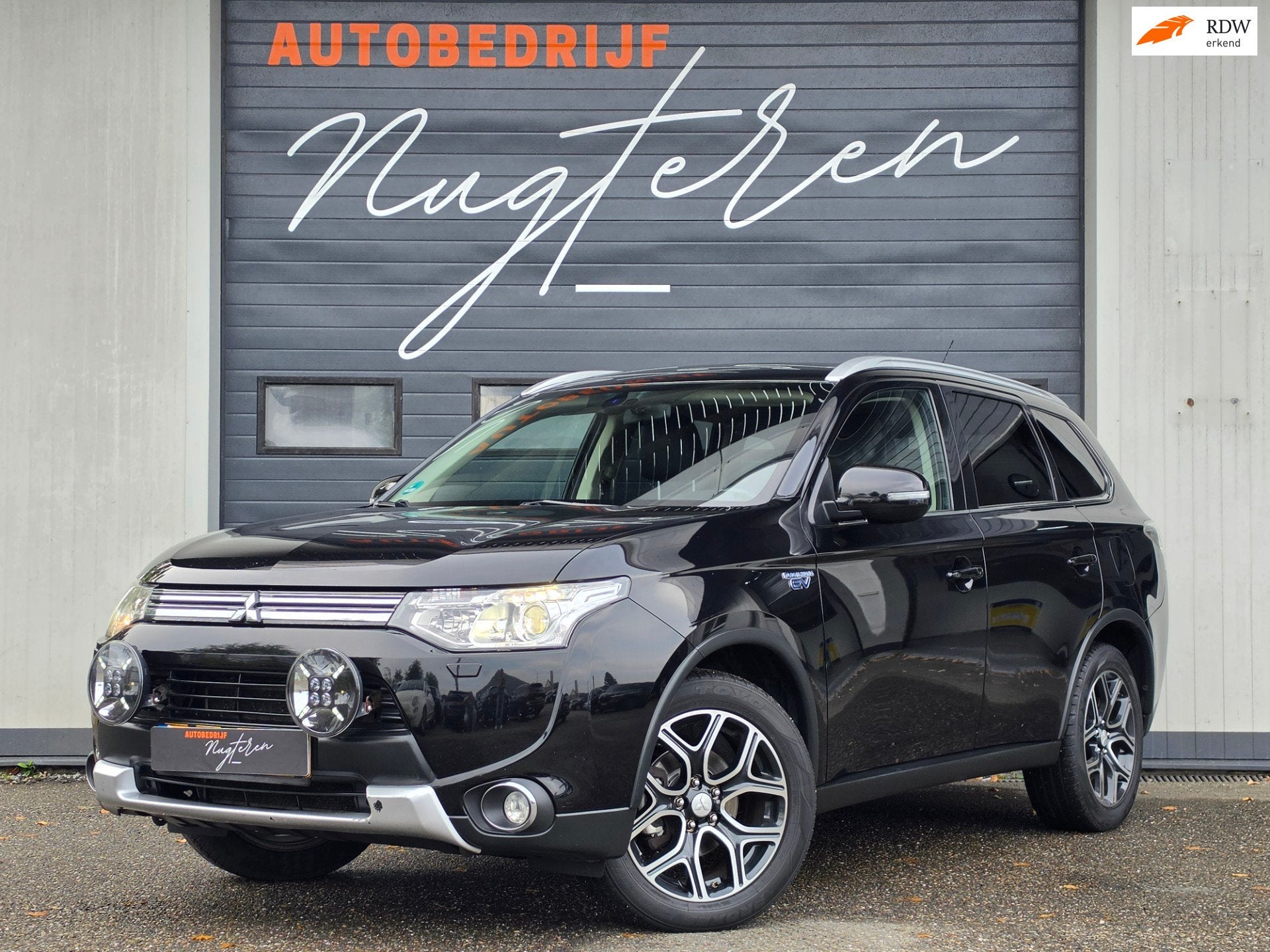 Mitsubishi Outlander 2.0 PHEV Executive Edition X-Line|Trekh, Auto's, Zwart, 4 cilinders, Leder en Stof, Zwart