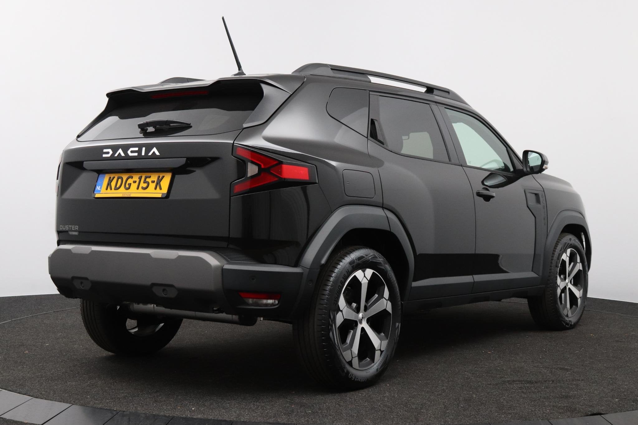 Dacia Duster 1.6 Hybrid 140 Journey | Demo | Pack Assist |, Auto's, Dacia, Stof, Gebruikt, 4 cilinders, Zwart
