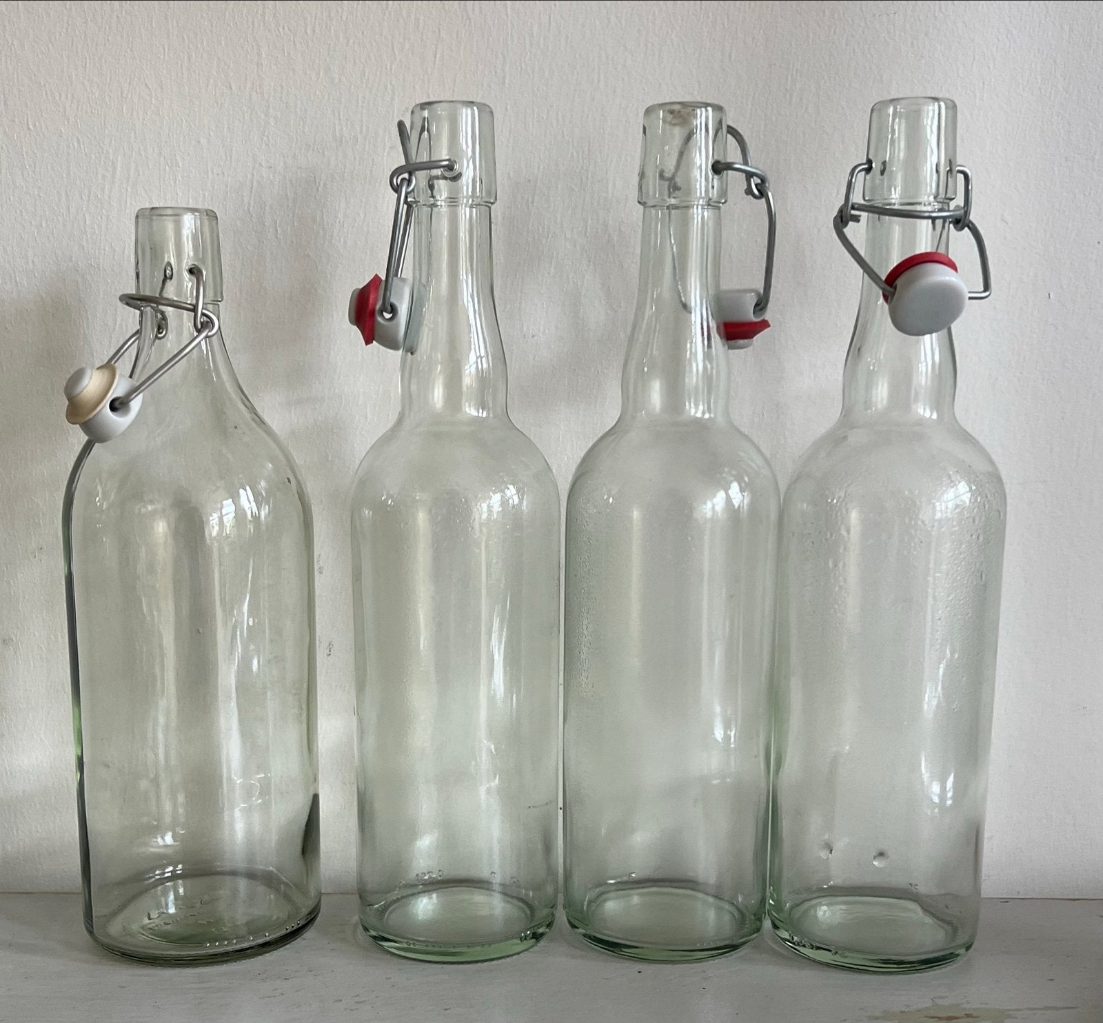 Set van 4 glazen flessen met beugelsluiting, Ophalen of Verzenden