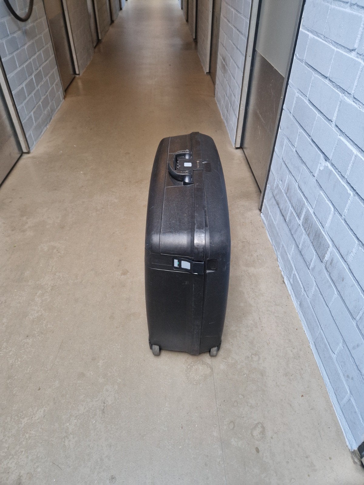 Zwarte reiskoffer met wieltjes en cijferslot, Ophalen of Verzenden