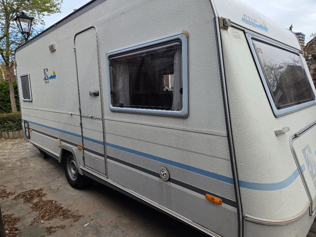 Complete Knaus 495TF met mover en z.g.a.n. Dorema voortent, Kachel, Rondzit, Frans bed, Particulier