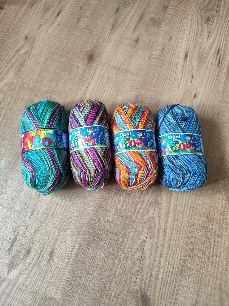 T.k. 4 nieuwe bollen Opal sokkengaren, Hobby en Vrije tijd, Ophalen of Verzenden, Nieuw, Breien of Haken, Wol of Garen