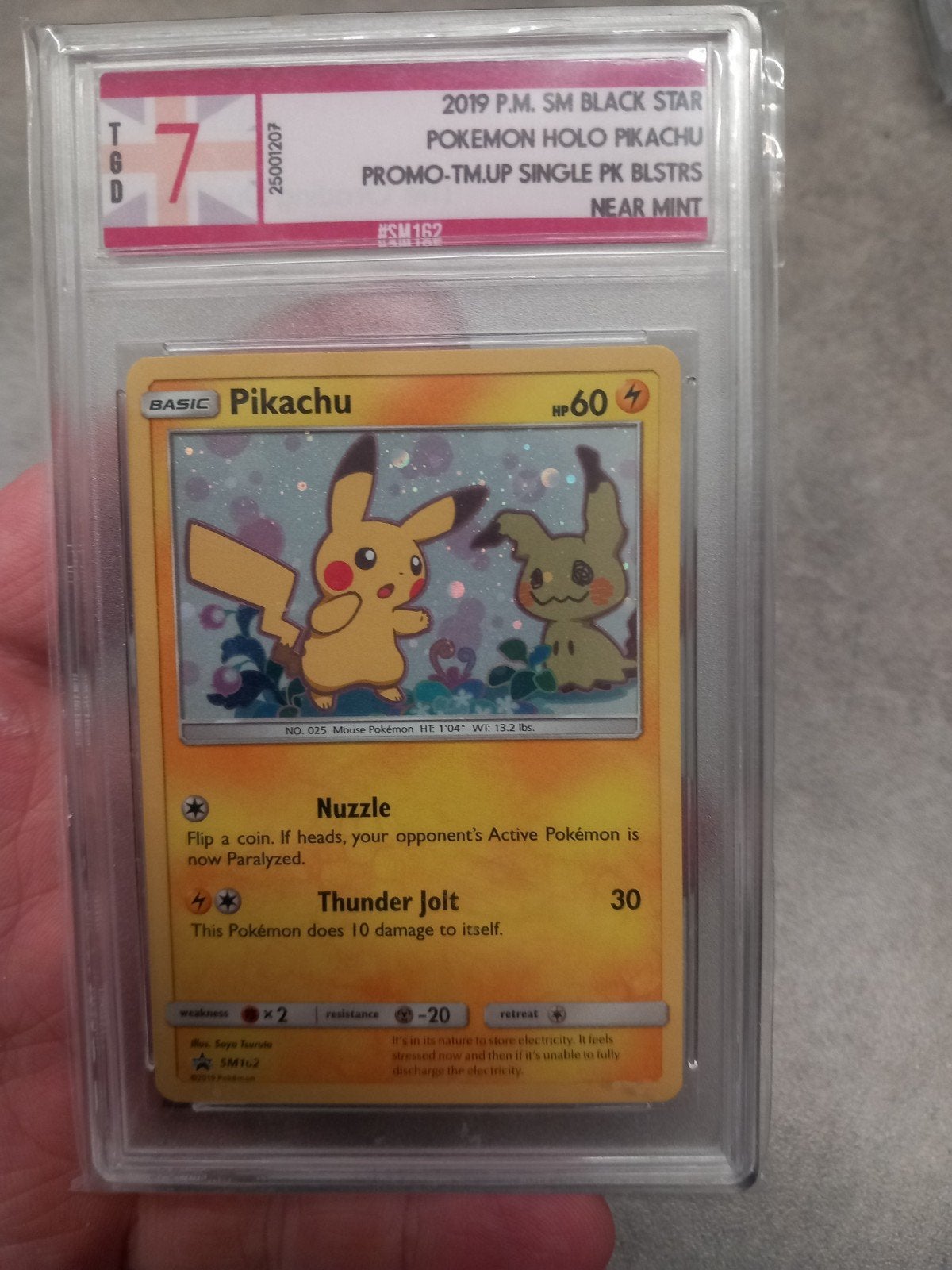 Pikachu & Mimikyu SM162 Promo TGD 7 Pokémon Kaart, Ophalen of Verzenden, Zo goed als nieuw, Losse kaart, Foil