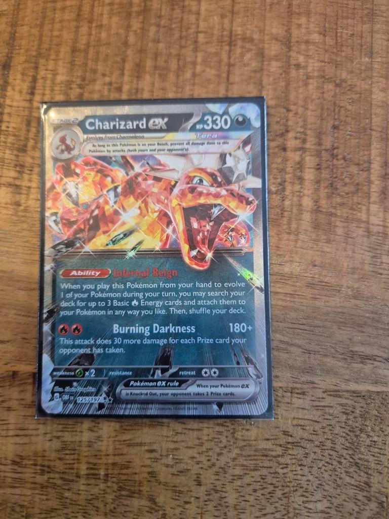 Charizard EX Tera 197/197 Obsidian Flames - zeldzaam., Ophalen of Verzenden, Zo goed als nieuw, Losse kaart, Foil