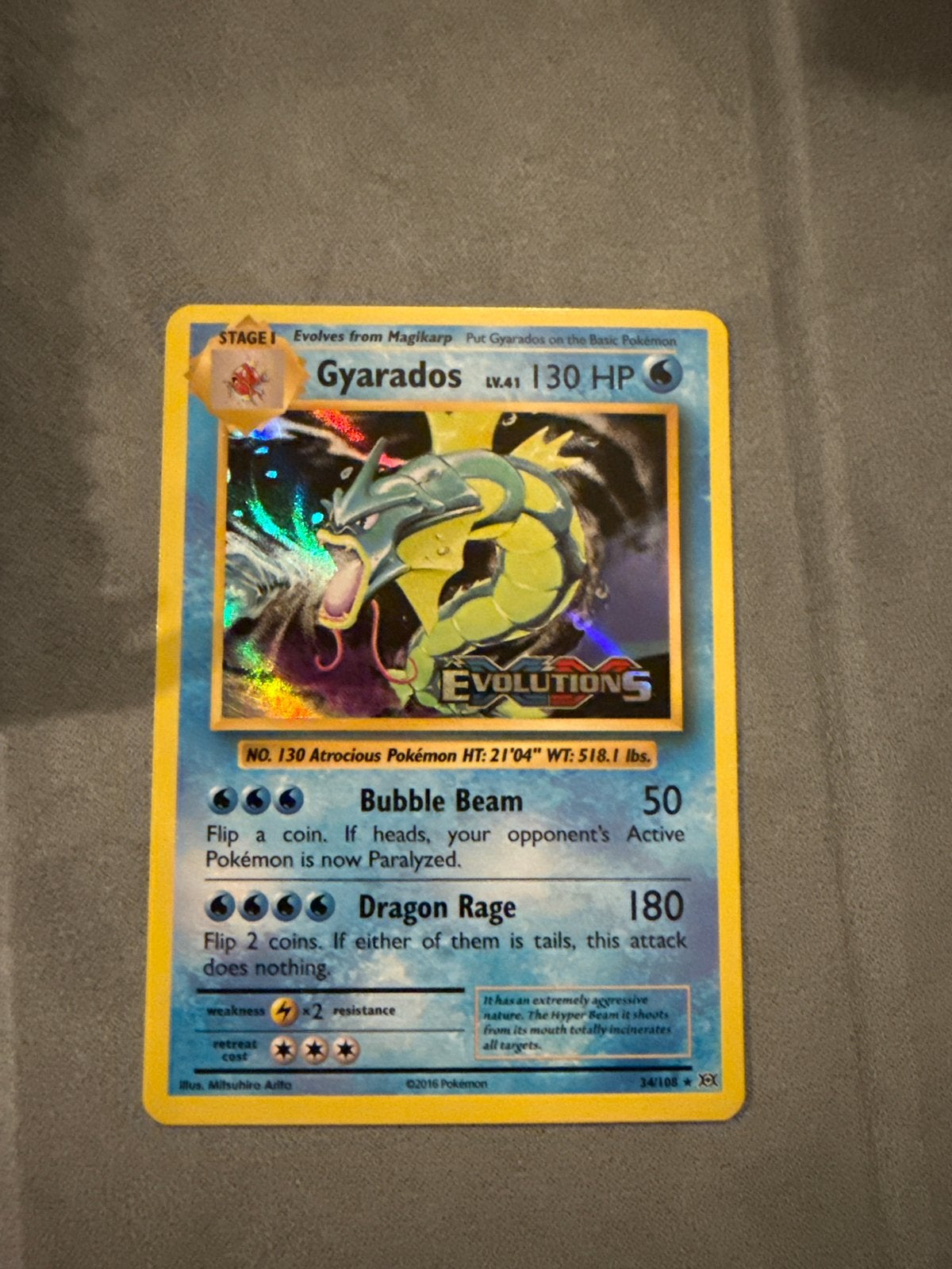 Gyarados Pokémon kaart stamped (XY Evolutions 34/108) Foil, Ophalen of Verzenden, Zo goed als nieuw, Losse kaart, Foil