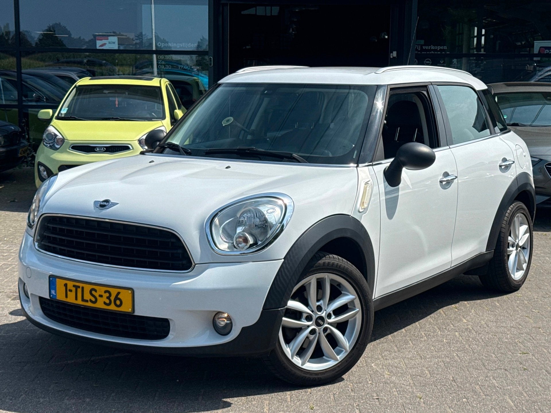 Mini Countryman 1.6 One Holland Street NAVI/PDC/CRUISE/AIRCO, Auto's, Voorwielaandrijving, Gebruikt, Leder en Stof, Wit