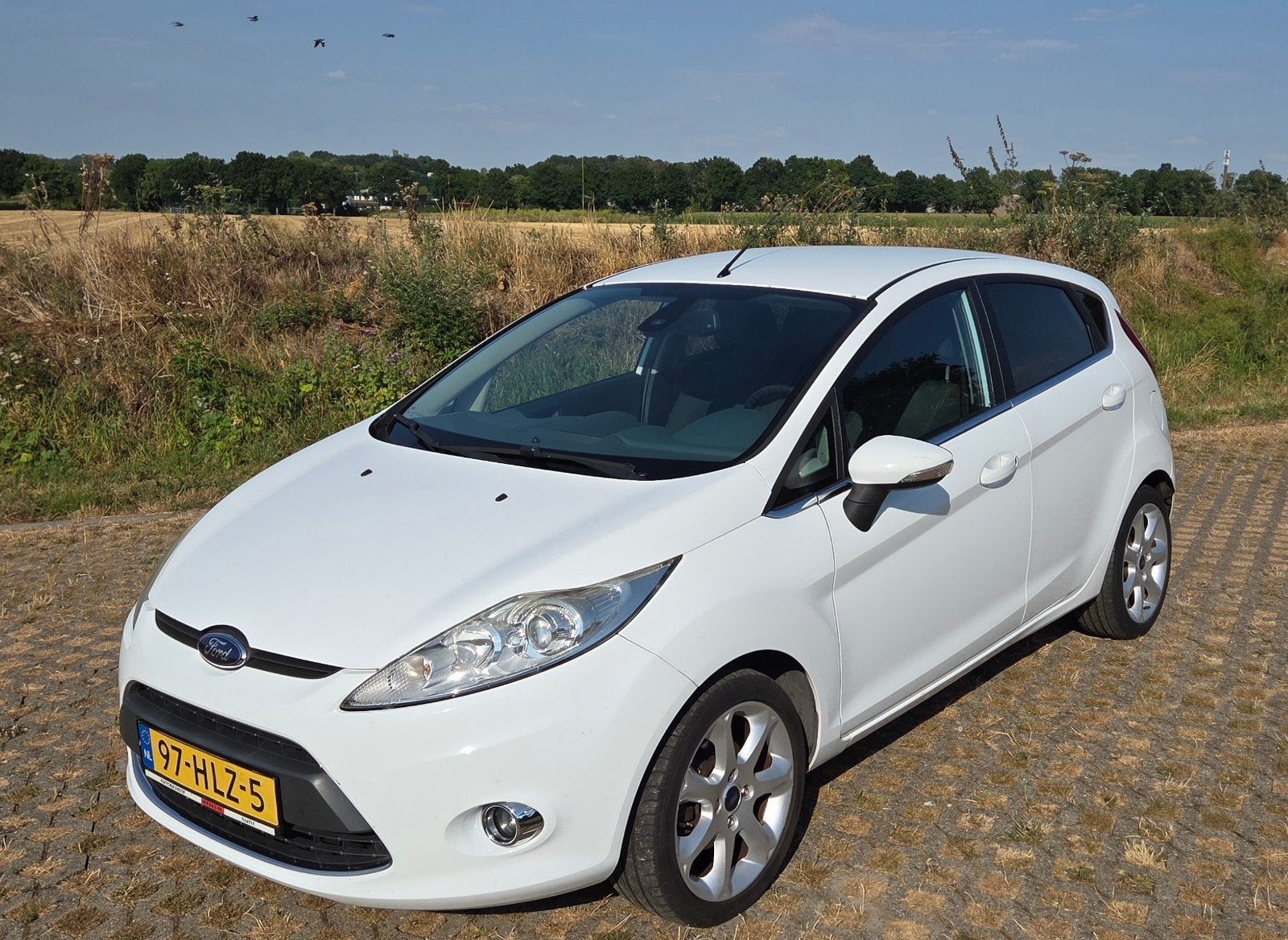 Ford Fiësta 1.4 71KW 5DR 2009 Wit, Auto's, Voorwielaandrijving, 40 €/maand, Wit, Origineel Nederlands