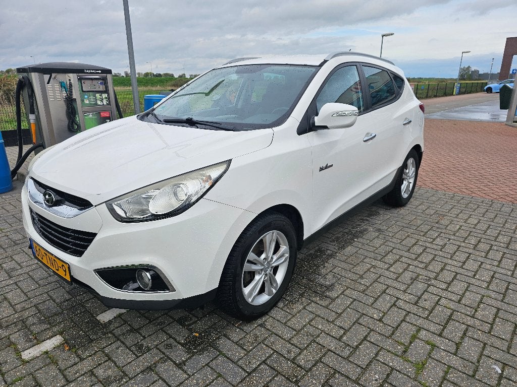 Hyundai iX35 1.6i GDI Blue 135pk 2012 Wit met LPG mee, Auto's, Voorwielaandrijving, 4 cilinders, Wit, Origineel Nederlands