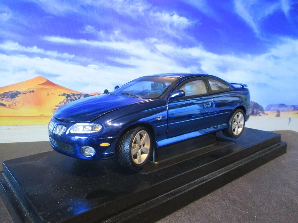 1/18 2004 Pontiac GTO ERTL LE 1/1750 Anodized Electric Blue, Hobby en Vrije tijd, Modelauto's | 1:18, Ophalen of Verzenden, Zo goed als nieuw
