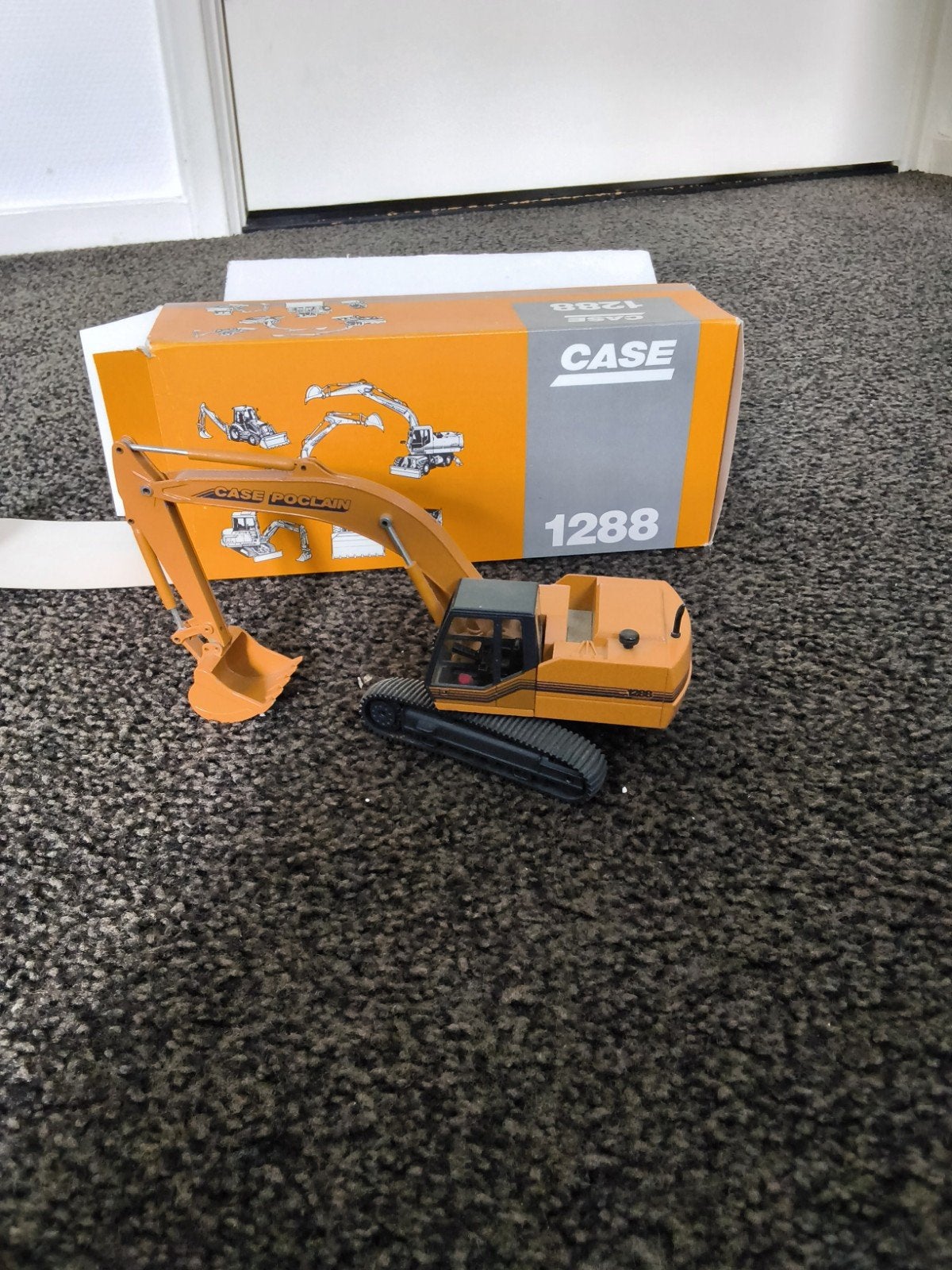 Case Poclain model te koop., Ophalen, Zo goed als nieuw, 1:50 of kleiner, Overige merken