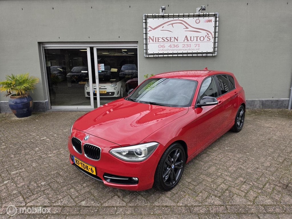 BMW 1-serie F20 118i Sportline Led/Xenon/Navi/Nwe Ketting, Auto's, 1-Serie, Euro 5, Zwart, 4 cilinders