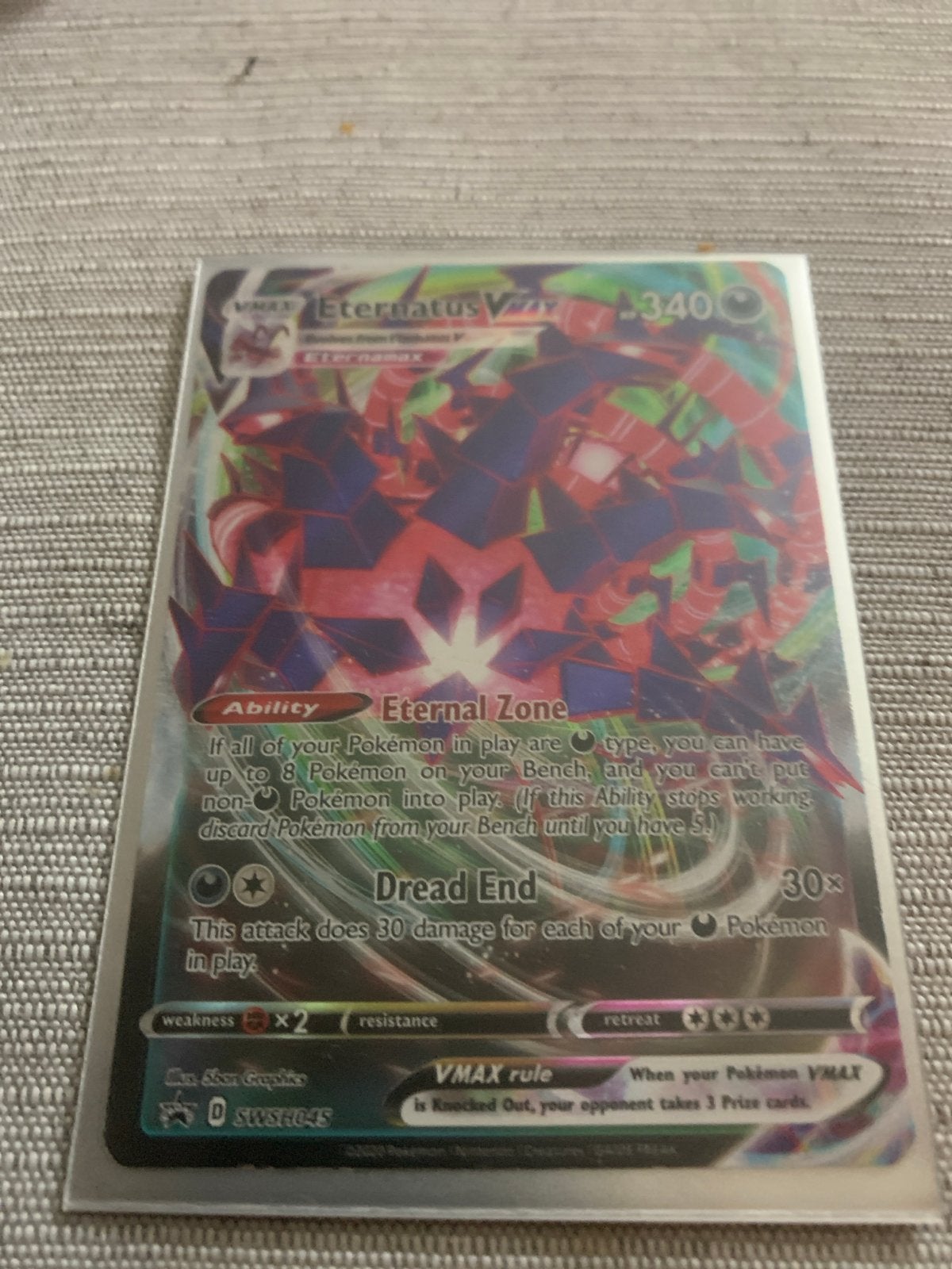 Eternatus VMAX SWSH045 Pokémon Kaart, Ophalen, Zo goed als nieuw, Losse kaart