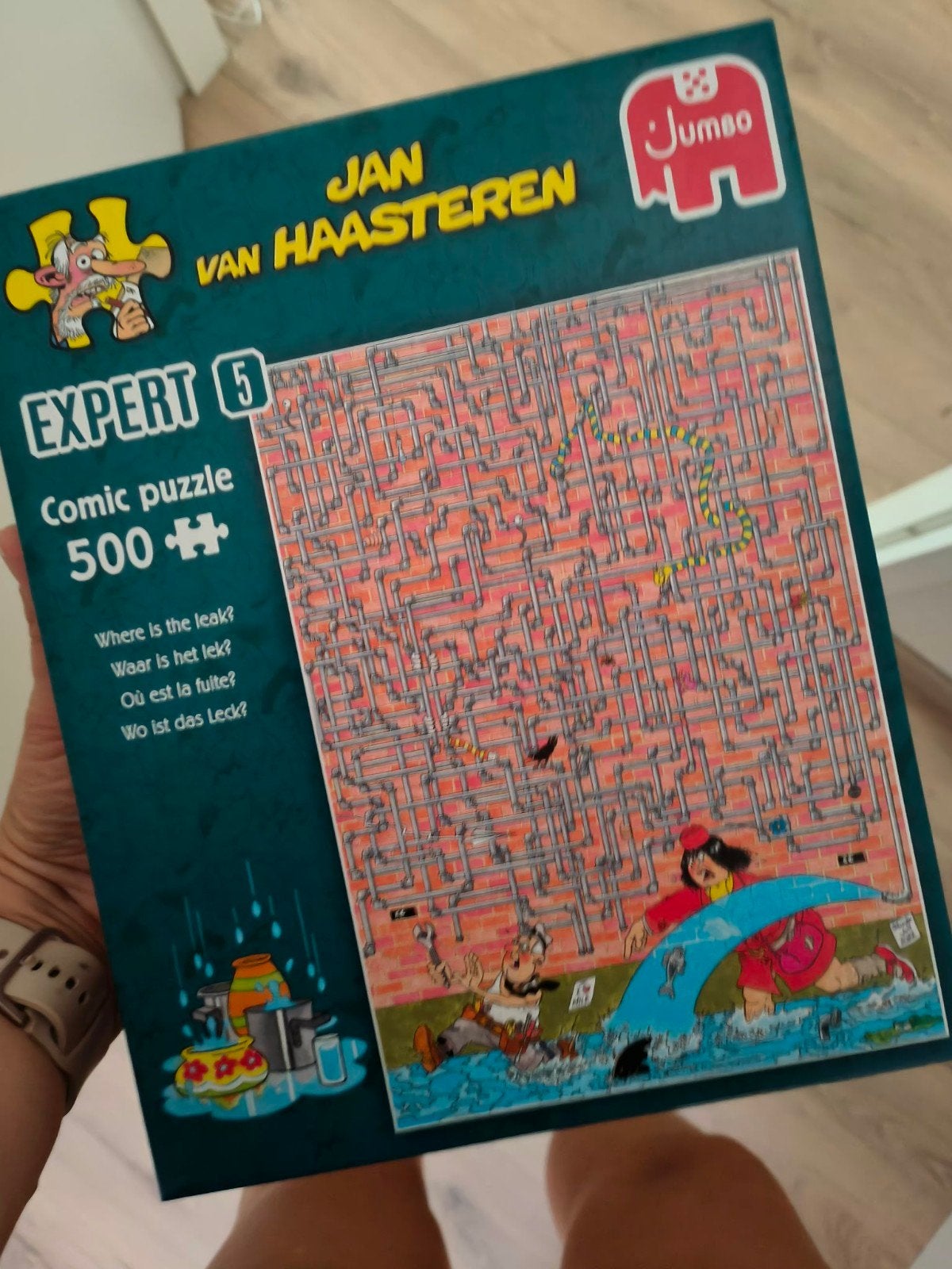 Jan van Haasteren Expert 500+ stukjes - Waar is het lek?, Hobby en Vrije tijd, Denksport en Puzzels, Ophalen of Verzenden, 500 t/m 1500 stukjes