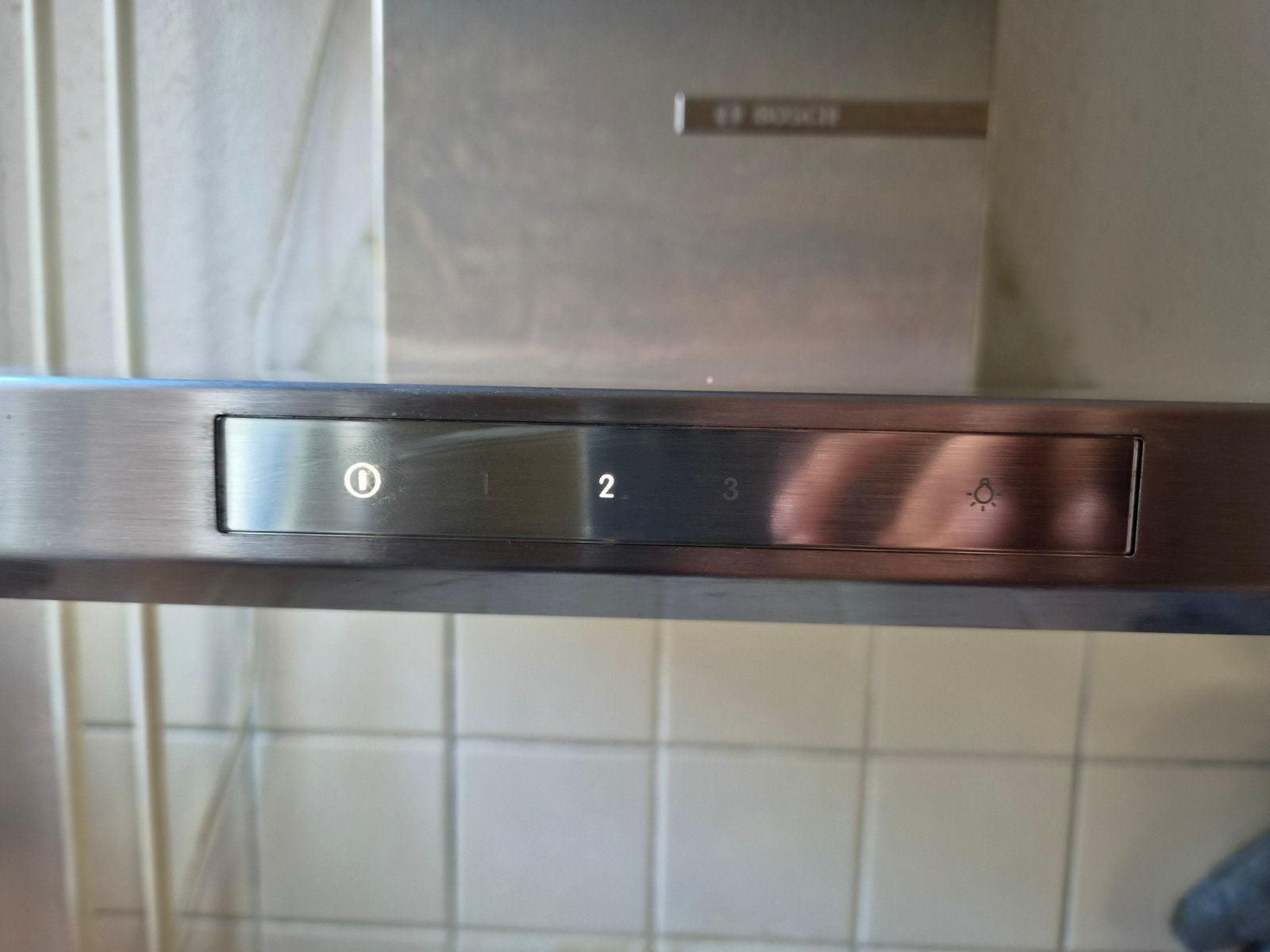 Bosch afzuigkap (3 jaar gebruikt) - DWB67LM50, Ophalen, Gebruikt, Inbouw, Wandschouwkap