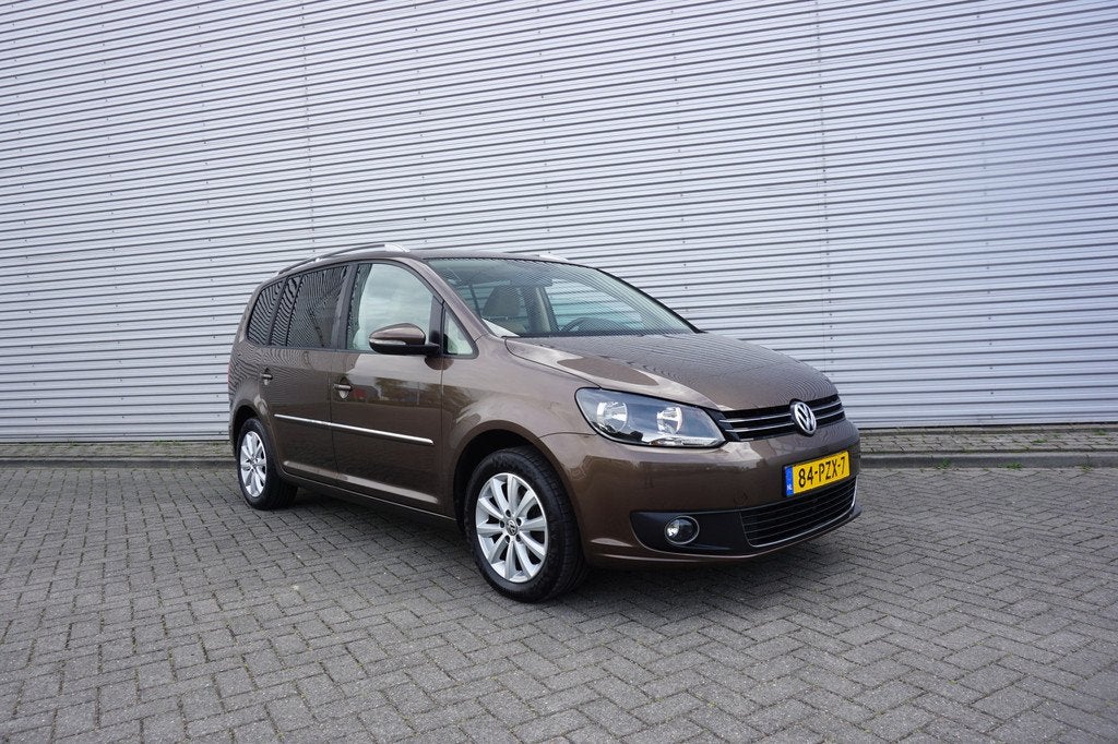 Volkswagen Touran 1.2 TSI Highline BlueMotion Airco / Navi /, Auto's, Volkswagen, Euro 5, Gebruikt, 4 cilinders, Bruin