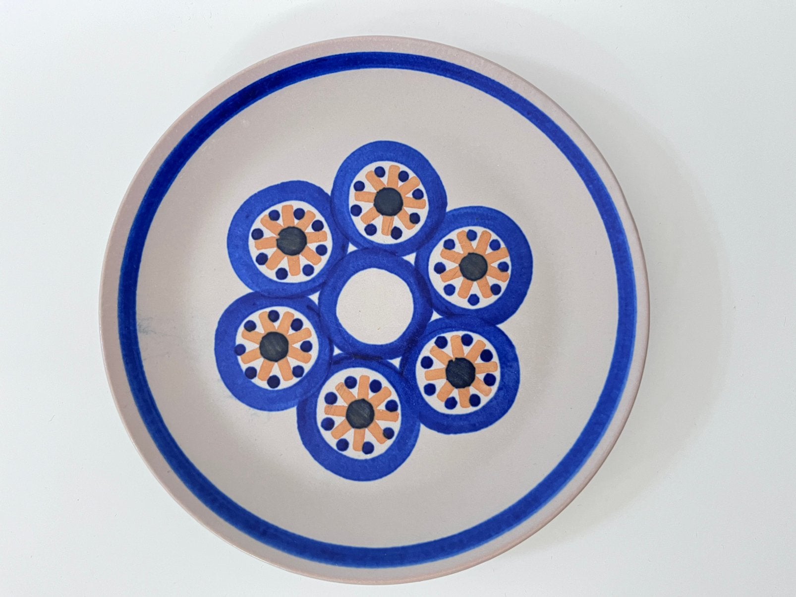 Vintage bord met geometrisch blauw/oker bloemmotief, Ophalen of Verzenden