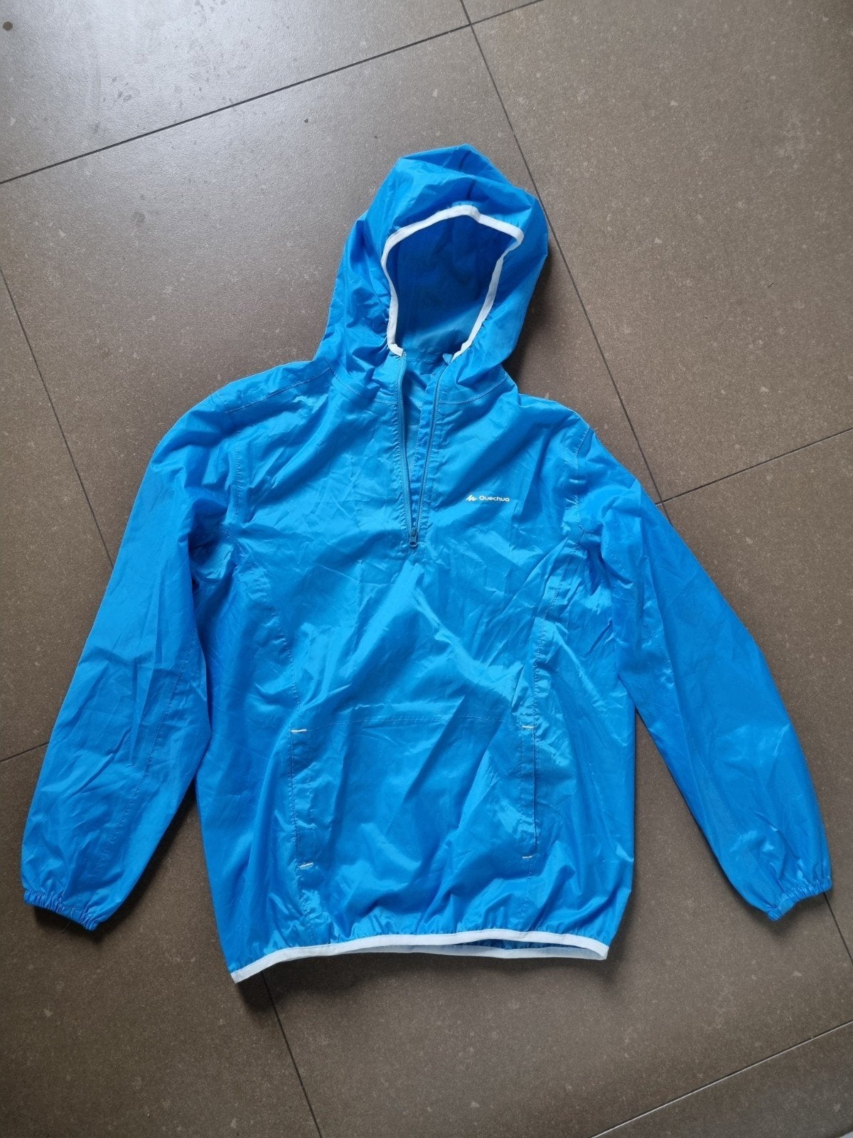 Quechua blauwe regenjas, opvouwbaar 12 - 14 jaar, Ophalen of Verzenden, Gebruikt, Decathlon, Jongen of Meisje