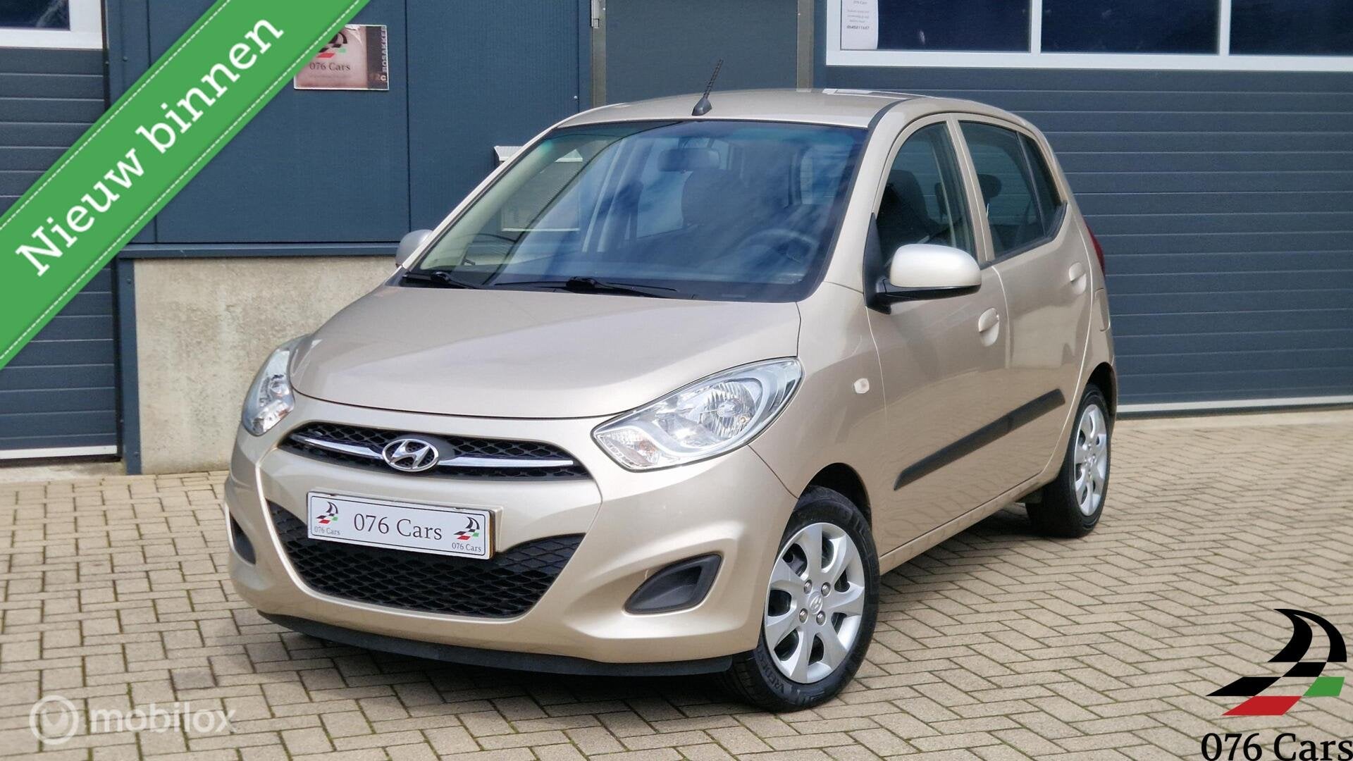 Hyundai i10 1.2 i-Drive Cool AUTOMAAT AIRCO PARKEERSENSOREN, Auto's, Hyundai, Euro 5, 31 €/maand, 4 cilinders, Beige