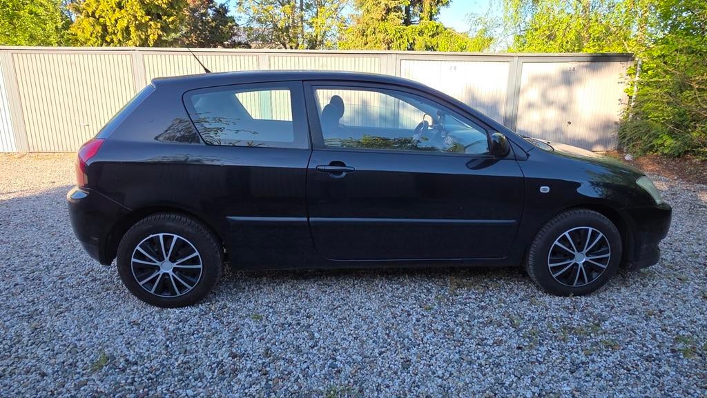 Toyota Corolla 1.4 Vvt-i 3DR Linea Terra 2003 Zwart, Auto's, Voorwielaandrijving, 4 cilinders, Corolla, Origineel Nederlands
