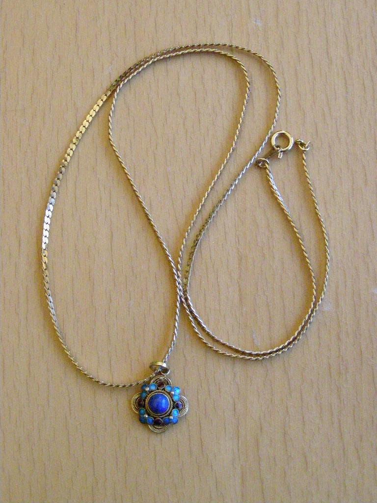 VINTAGE HALSKETTING MET ORNAMENT JAPAN GOUDKLEURIG 61 CM, Ophalen of Verzenden, Zo goed als nieuw, Goud, Overige materialen
