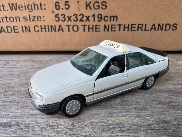 1:43 Opel Omega A Taxi Amsterdam GAMA, Ophalen of Verzenden, Gebruikt, Auto, Gama