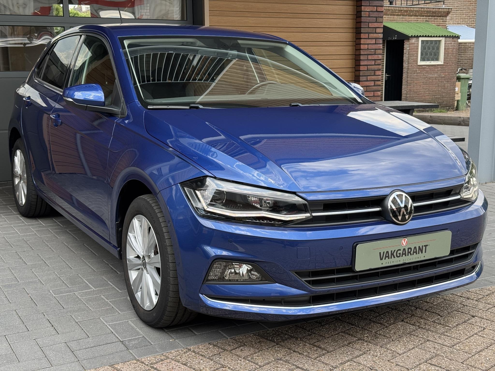 Volkswagen Polo 1.0 TSI Highline,Navi,Appcar,Cruise,Camera, Auto's, Voorwielaandrijving, Dealer onderhouden, Gebruikt, Blauw